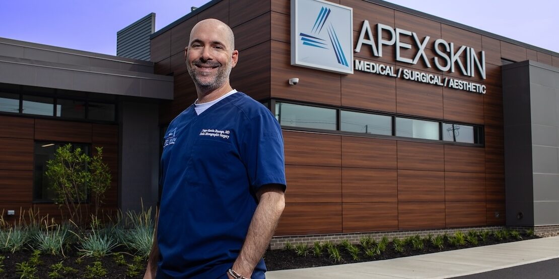 Dr. Garcia Apex Skin Building Dr. Garcia outside Apex Skin Dermatology Office in Mayfield Heights Ohio.